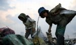 children diggin for food in&nbsp;landfill